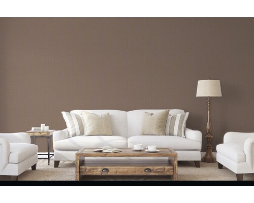 Obývací pokoj s pohovkou, křesly, stolem a stojací lampou