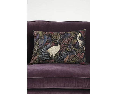 Dekorační polštář s ptačím vzorem na pohovce