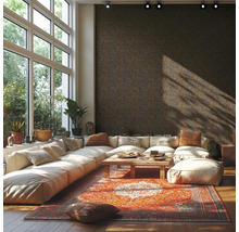 Světlý obývací pokoj s modulární pohovkou, dřevěným stolem a vzorovaným kobercem