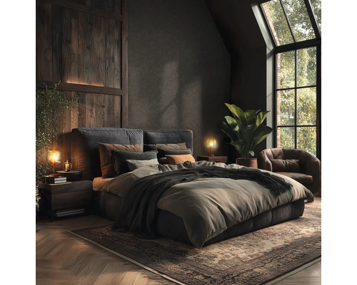 Ložnice s postelí, nočními stolky, lampami, kobercem a křeslem v tmavých barvách