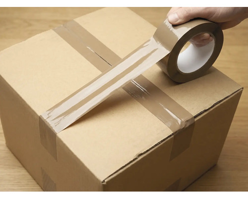 Balicí karton uzavřený lepicí páskou