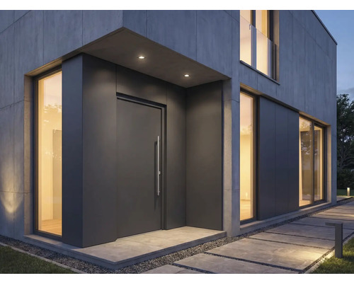 Moderní dům se šedými vchodovými dveřmi a velkými okny