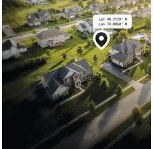 Letecký pohled na obytnou čtvrť s domy, zahradami a ulicemi