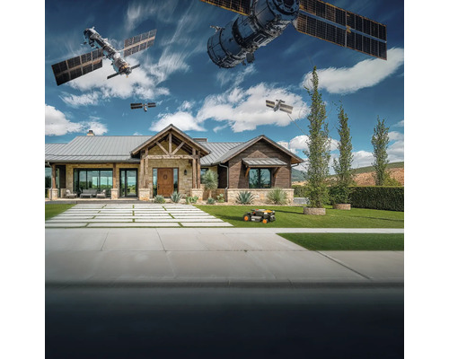 Moderní dům s robotickou sekačkou a satelity na obloze