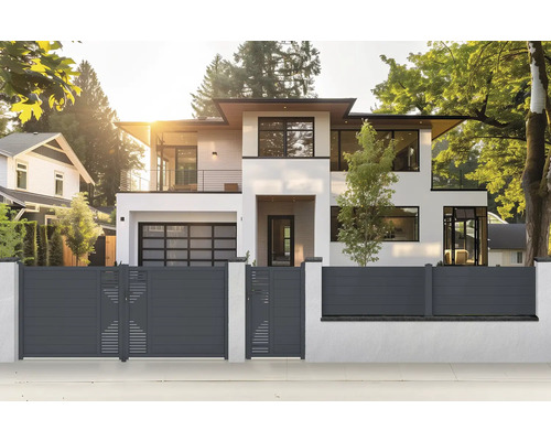 Moderní dům s vjezdovou bránou a plotem