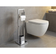 Toaleta s volně stojícím držákem toaletního papíru a toaletní štětkou v koupelně