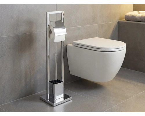 Toaleta s volně stojícím držákem toaletního papíru a toaletní štětkou v koupelně