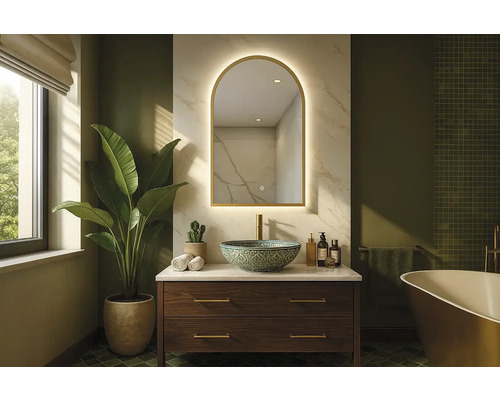 Koupelna s umyvadlem, zrcadlem a rostlinou pro světlé a prostorné prostředí.