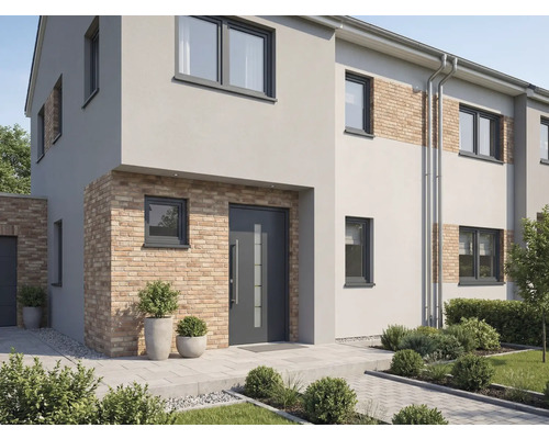 Fasáda moderního obytného domu s okny a vchodovými dveřmi