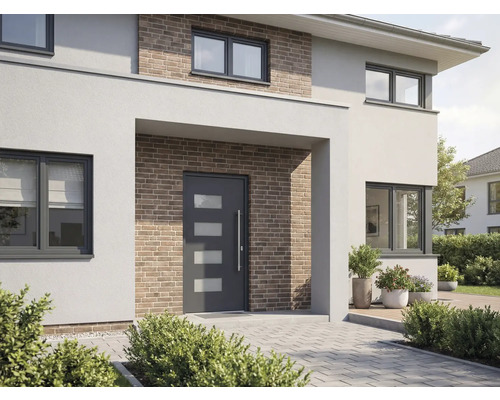 Moderní dům s vchodovými dveřmi, okny a cihlovou fasádou