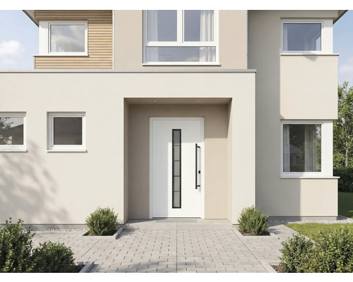 Moderní dům se vstupními dveřmi a dlážděnou cestou