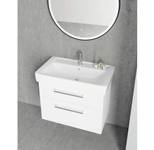 Moderní bílá skříňka pod umyvadlo se dvěma zásuvkami, bílým umyvadlem, chromovanou baterií a kulatým LED zrcadlem u šedé betonové stěny.