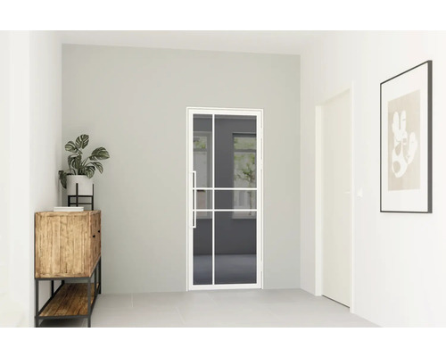 Moderní skleněné dveře v loftovém designu s bílým rámem a čtyřmi tabulemi v prosvětlené, minimalistické místnosti s komodou a rostlinou.