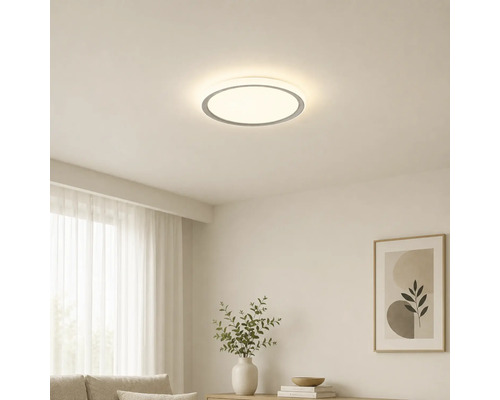 Kruhové stropní LED svítidlo ve světlém, moderně zařízeném obývacím pokoji s minimalistickým designem.
