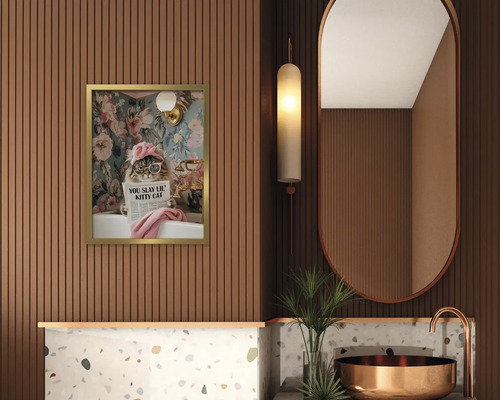 Moderní koupelna s nástěnnými panely se vzhledem dřeva, rámovaným obrazem, oválným zrcadlem, terrazzo obkladem a kulatým umyvadlem na desku.