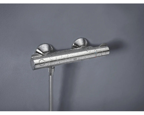 Termostatická sprchová baterie Grohe pro montáž na stěnu s leštěným povrchem a logem Grohe