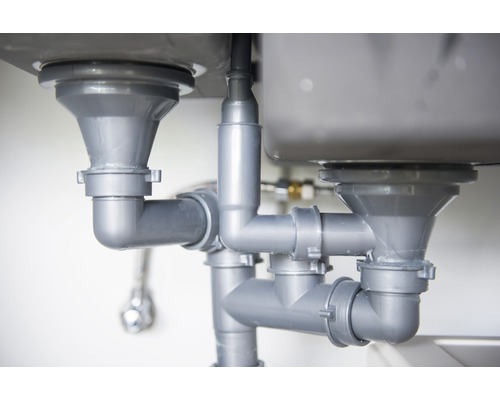 Odtokové trubky pod umyvadlem