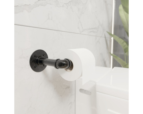 Držák toaletního papíru ze železné trubky s rolí toaletního papíru