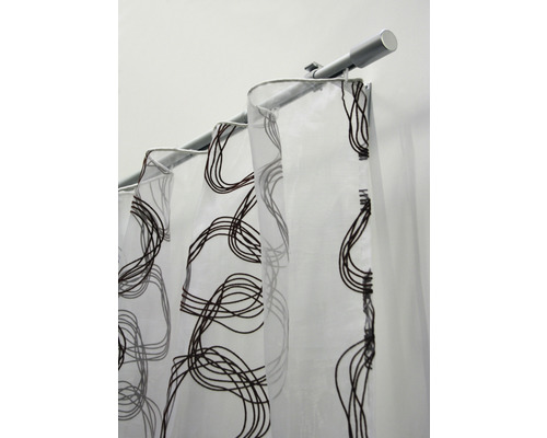 Záclona se závěsnými poutky a vzorem na záclonové tyči