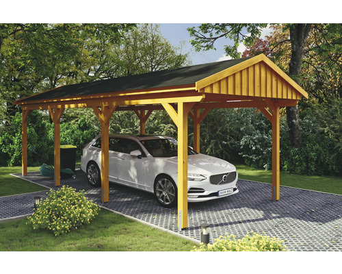Přístřešek na auto SKAN HOLZ Fichtelberg 317 x 808 cm dub světlý vč. šindelů Dřevěný přístřešek pro auto s autem na dlážděném povrchu