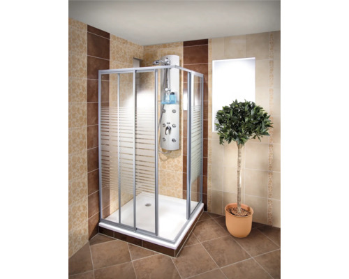 Rohová sprcha se sprchovým panelem v koupelně s obklady