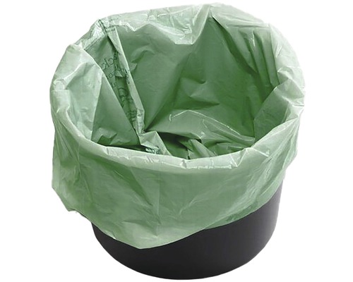 Zelený biologicky rozložitelný odpadkový pytel v černém odpadkovém koši