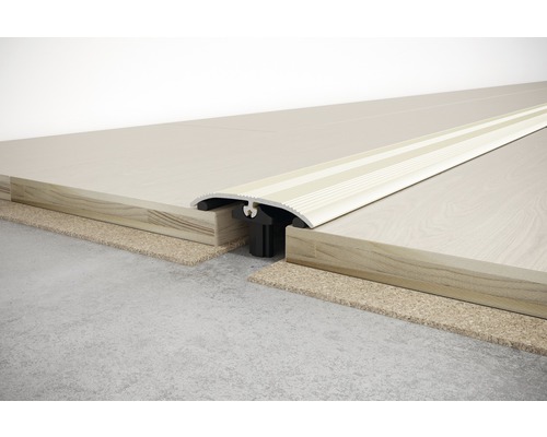 Podlahový profil pro spojení dvou podlahových krytin.