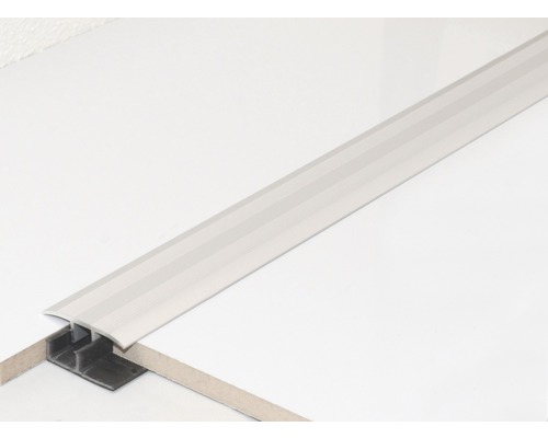 Podlahový profil pro zakrytí dilatační spáry