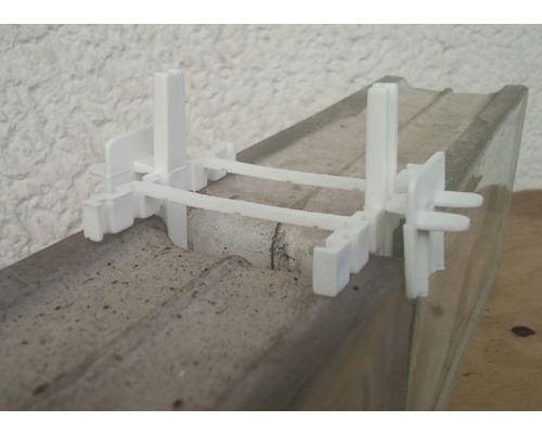 Nivelační systém obkladů na cementovém podkladu