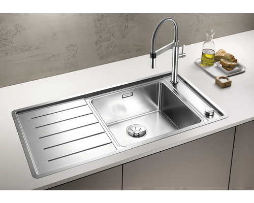 Nerezový dřez s odkapávací plochou a baterií