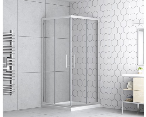 Rohová sprcha se skleněnými dveřmi v koupelně s obklady