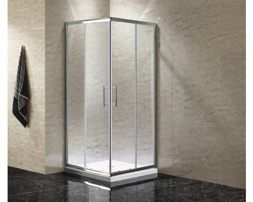 Rohová sprcha s čirými skleněnými dveřmi a stříbrnými rámy v koupelně