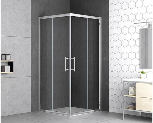 Rohová sprcha s čirými skleněnými dveřmi a stříbrnými rámy v koupelně.