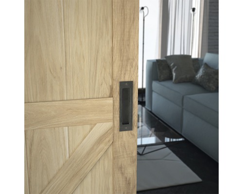Dřevěné posuvné dveře s zapuštěnou rukojetí v moderně zařízeném obývacím pokoji