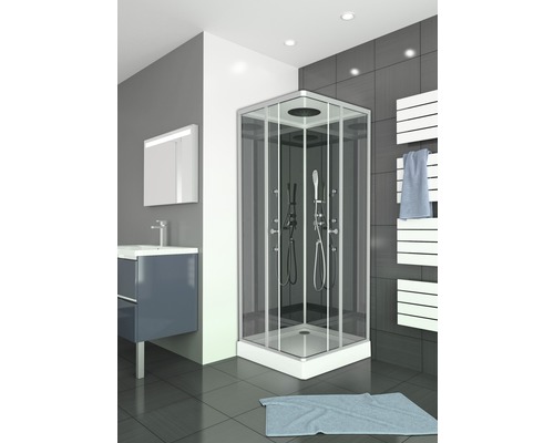 Moderní koupelna s rohovou sprchou, umyvadlem a ohřívačem ručníků