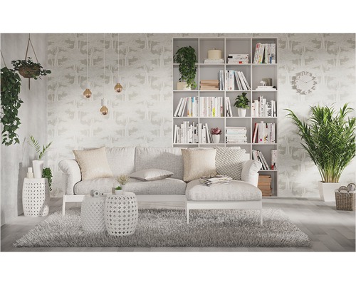 Obývací pokoj s pohovkou, knihovnou a dekorativními prvky pro útulnou atmosféru.