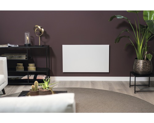 Obývací pokoj s elektrickým topením na zdi