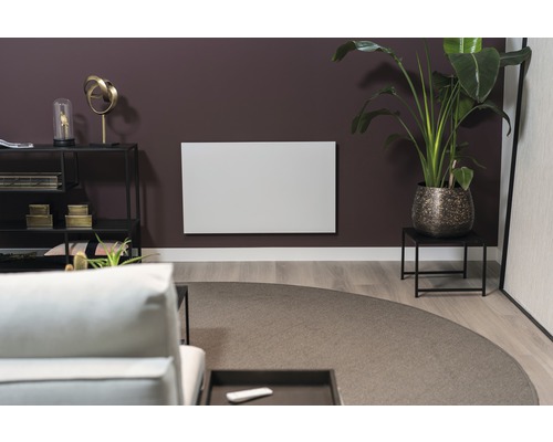 Obývací pokoj s infračerveným topením na zdi