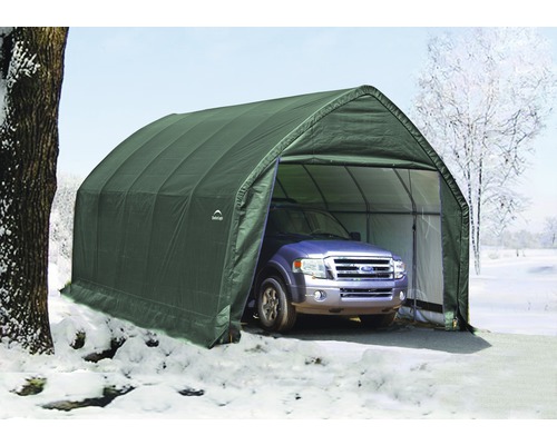Auto v zelené, proti povětrnostním vlivům odolné stanové garáži v zimě