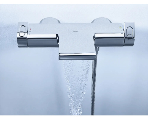 Termostatická baterie na omítku s proudem vody a logem Grohe
