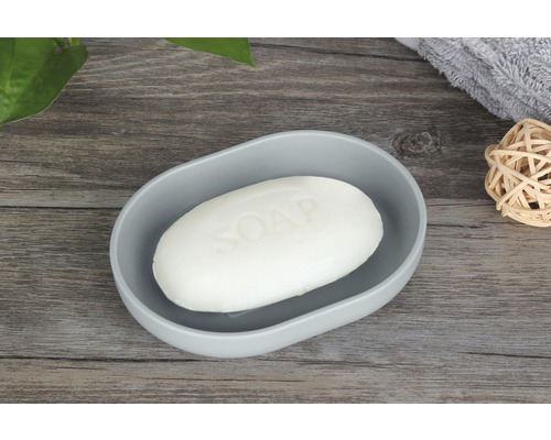 Miska na mýdlo s mýdlem na dřevěném stole