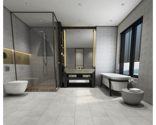 Světlá koupelna se sprchou, umyvadlem a vanou.