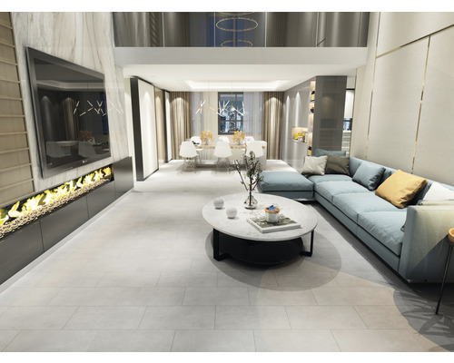 Světlá a moderní obývací scéna s rohovou sedačkou, konferenčním stolkem a krbem