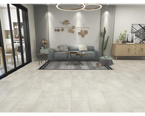 Obývací pokoj s pohovkou, stolem, komodou a dekoracemi, který nabízí světlé a organizované prostředí.