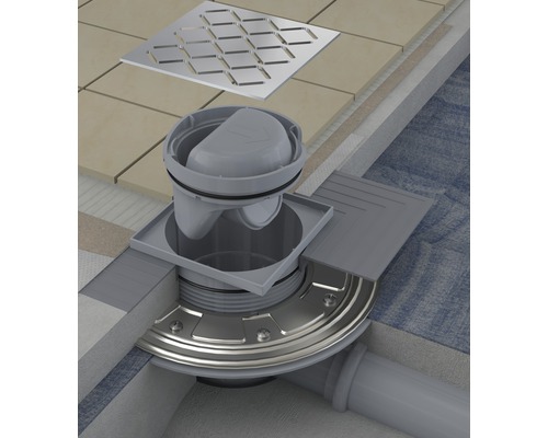 Průřez podlahovým odtokem v koupelně s krytem a těsnicí manžetou