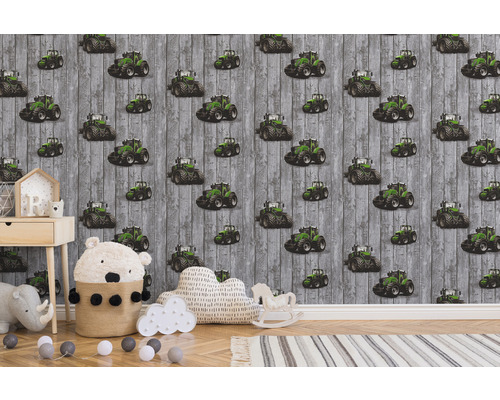 Dětský pokoj s tapetou s motivem traktoru a hračkami