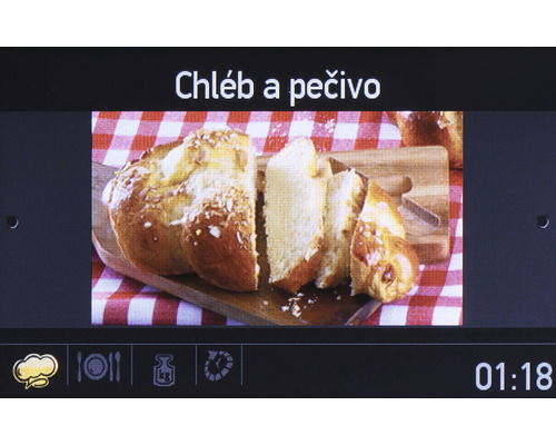 Chléb a pečivo na dřevěném prkénku