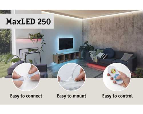 LED pásek MaxLED 250 v obývacím pokoji se snadným připojením, montáží a ovládáním pomocí dálkového ovladače.