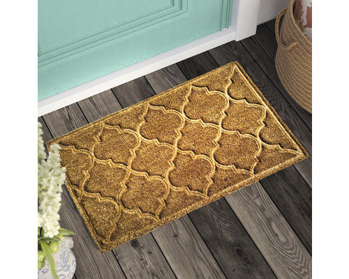 Rohožka s marockým vzorem před dveřmi