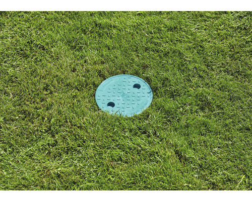 Kulaté revizní šachtové víko v trávníku